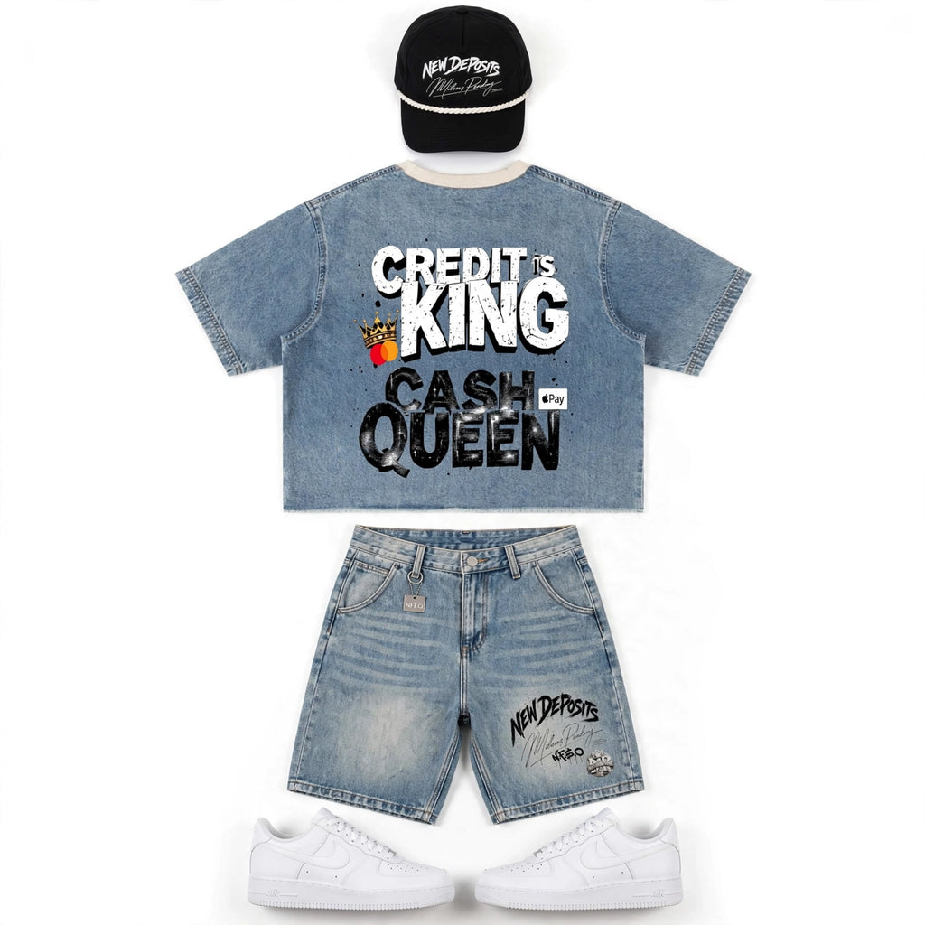 FLAT-LAY:NFEO 
Millions Pending NFEO Heavyweight Vintage-Washed Denim Set – Distressed Raw-Hem Crop Tee and Matching Denim Shorts Featuring New Deposits Branding and Credit Is King Cash Queen Back Graphic
