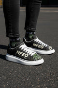 Side by side view: NFEO Built For The Few custom platform sneakers by Millions Pending. This streetwear-inspired chunky kick features premium black leather, signature palm tree print, fat white laces, and a bold white platform sole. The ultimate designer statement piece for the urban grind. Built for those who demand elite style and all-day comfort. Not For Everyone.