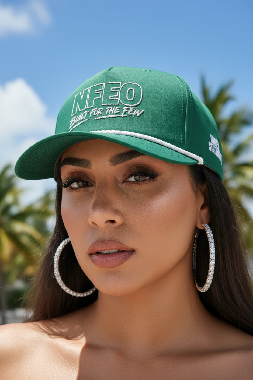 Female model: NFEO Richardson Rope Hat featuring bold 'Built For The Few' embroidery. Premium black snapback with signature white rope detail. Luxury streetwear headwear for entrepreneurs. A high-quality, structured essential accessory from the NFEO collection, representing the Built For The Few brand mission and elite urban fashion standards