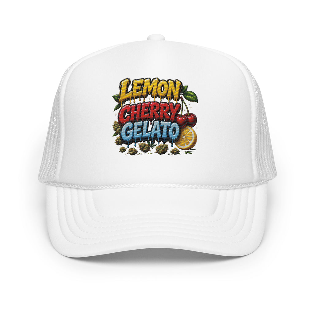 A white trucker hat with a colorful 'Lemon Cherry Gelato' graphic on the front panel, featuring illustrations of cherries, a lemon slice, and gelato cones.