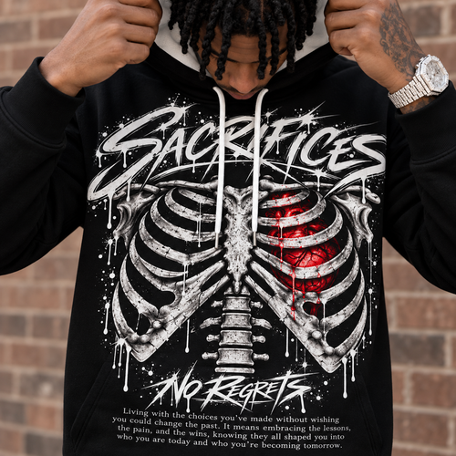 Close-up product detail
Close-up of the SACRIFICES black hoodie showing the detailed ribcage and red anatomical heart graphic, NO REGRETS typography and definition paragraph, with realistic fabric texture, skin detail and diamond-crusted watch.
