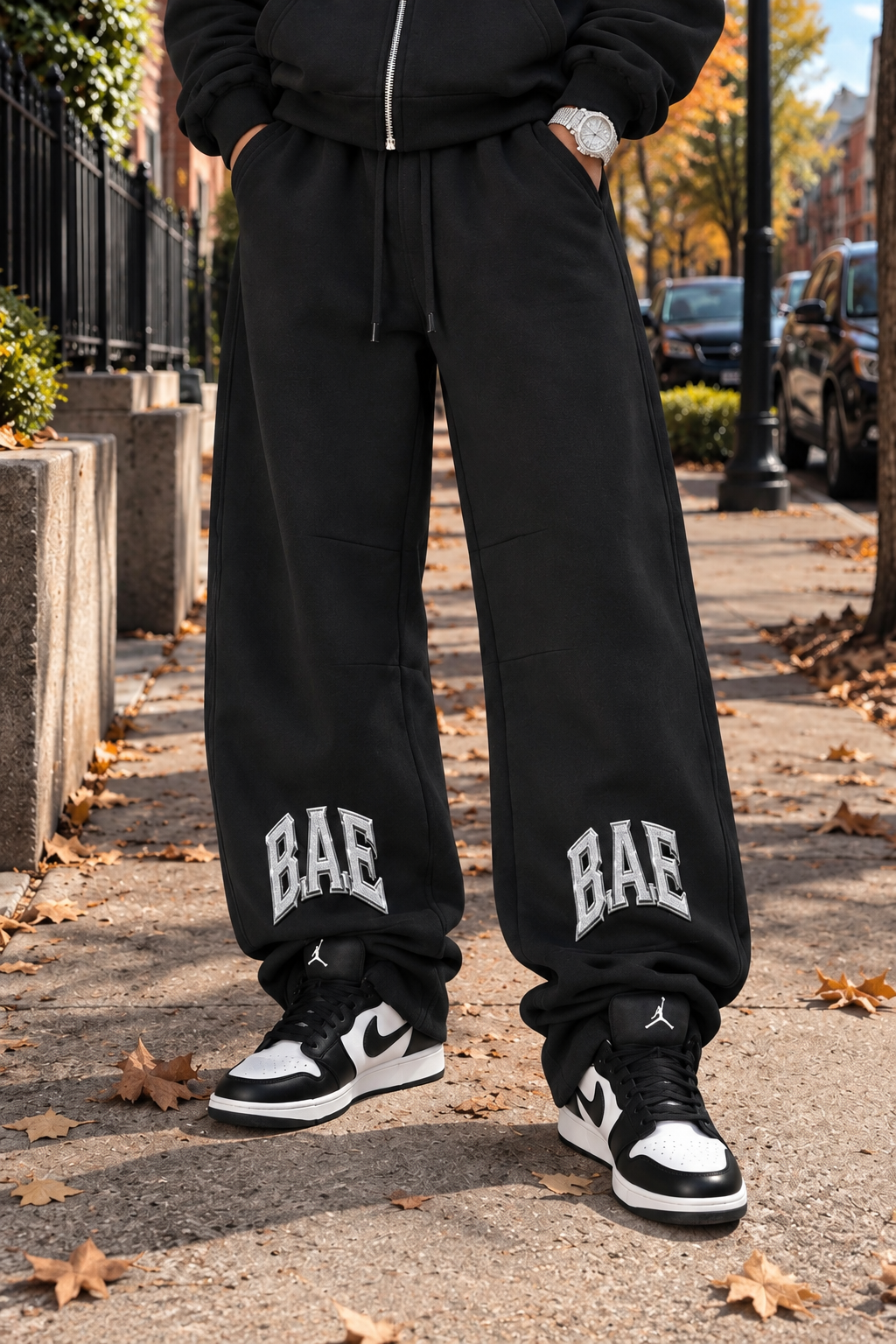 Black
B.A.E. Build An Empire black sweatpants featuring bold BAE graphic lettering, heavyweight fleece streetwear design, relaxed wide-leg fit, and drawstring waist. Entrepreneur streetwear pants for casual everyday fashion.