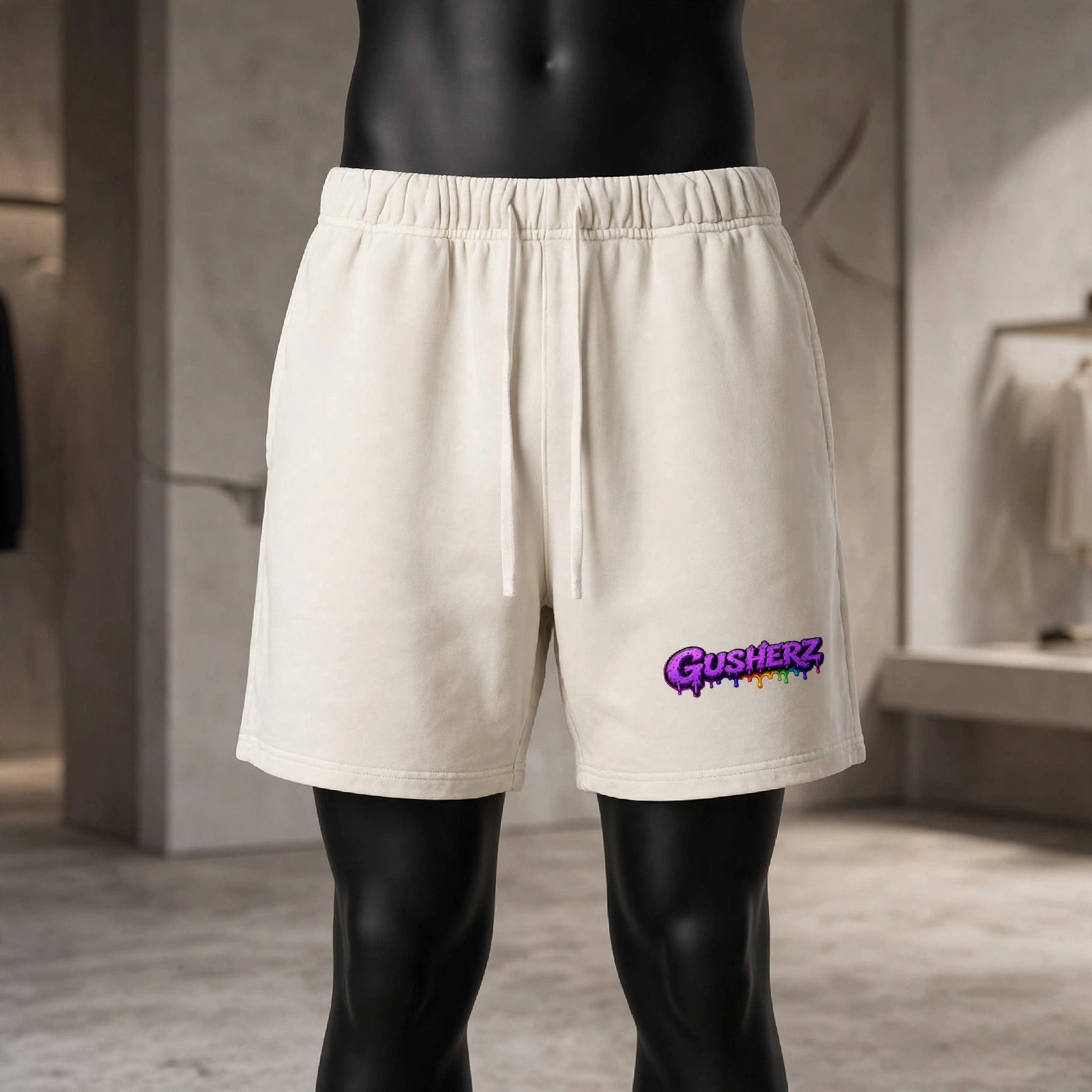 NFEO GUSHERZ Cream Off White Vintage Shorts Unisex Luxury Streetwear - ZAZA DROP 002 Heavyweight Cotton Shorts - Designer Beige Cannabis Culture Shorts with Purple Rainbow Drip GUSHERZ Logo Left Leg, Above Knee Boxy Fit, Premium Streetwear Essentials, Not For Everyone Built For The Few Limited Drop Collectible Apparel