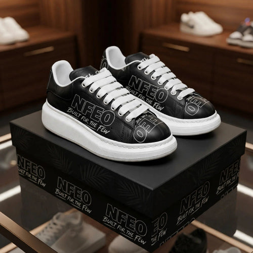 Front Side by side /Hero Shot: NFEO X-Ray Colorway unisex platform chunky-sole sneakers — black on black ghost-print faux leather upper with NFEO Built for the Few branding, white fat laces, and bold white EVA platform sole. Limited edition stealth luxury streetwear sneakers. Made to order.